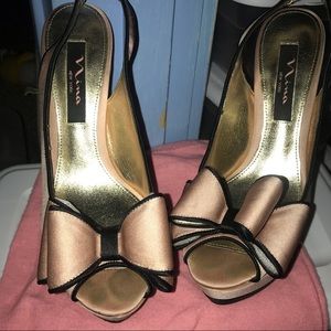 Satin pink and black pumps.